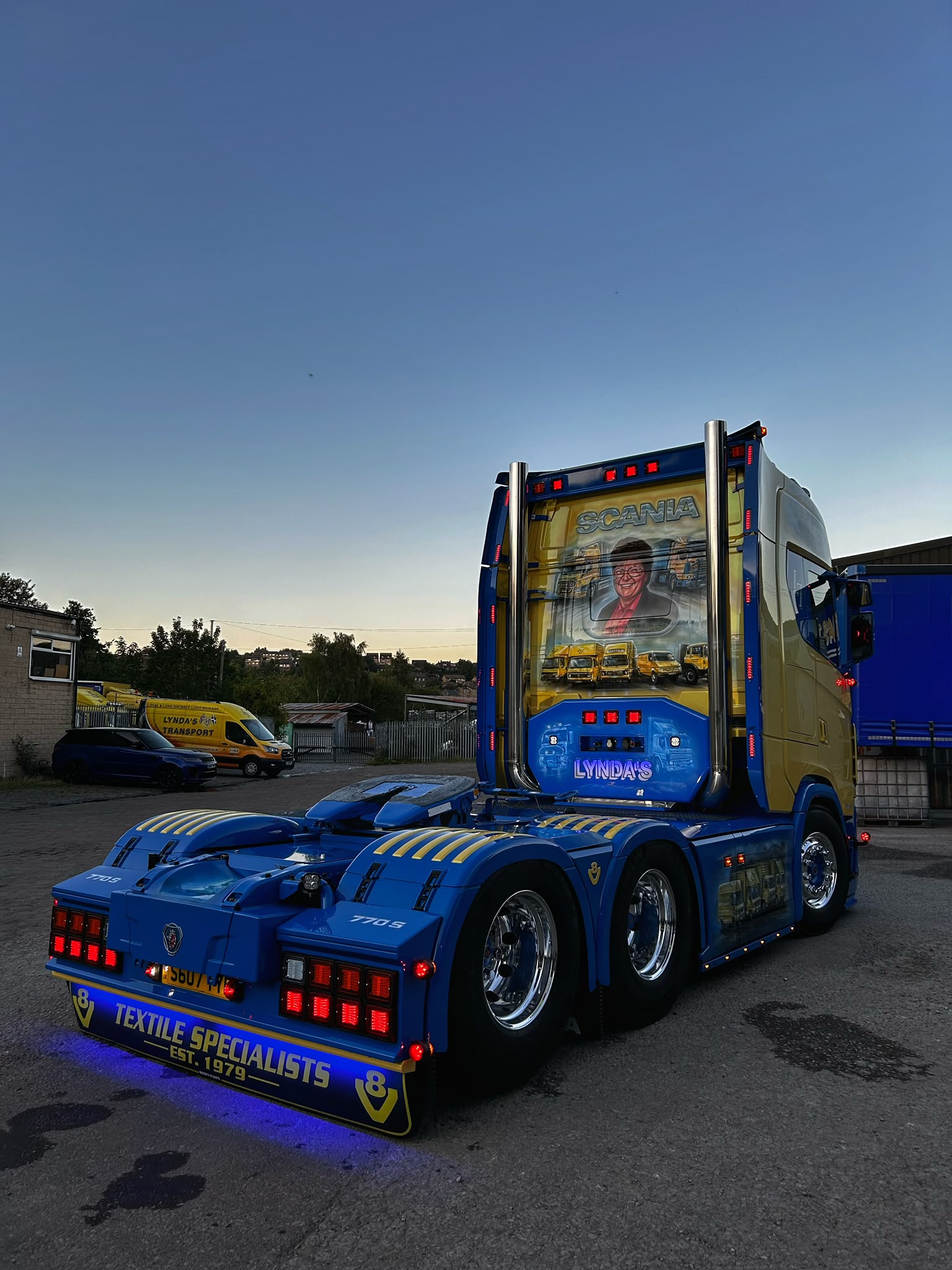 Rear view of a Lynda's Transport Scania cab with tribute artwork